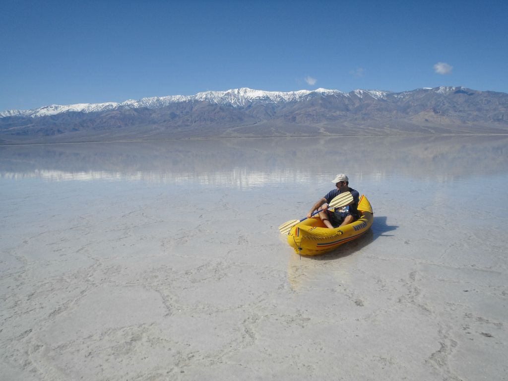 Two pictures showing me kayaking with Telescope Peak in the background: