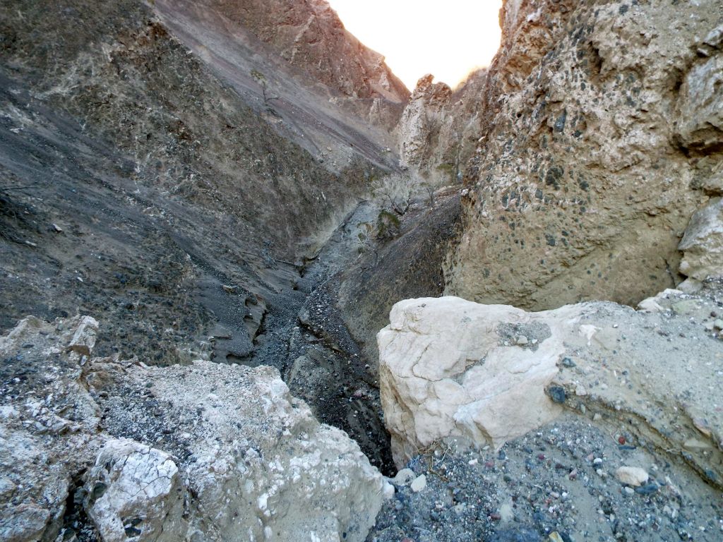 Walking up to the rim of the 1st major dry fall of upper Corkscrew Canyon.  From a distance, it looks impassable: