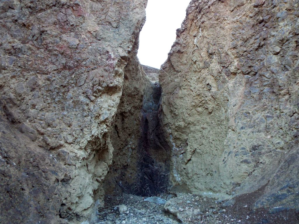 I took a peek up a side canyon which joined the main one and spotted this major dry fall a short distance in: