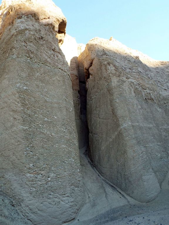 The main side canyon starts out with this section of high vertical walls which have eroded and formed an opening: