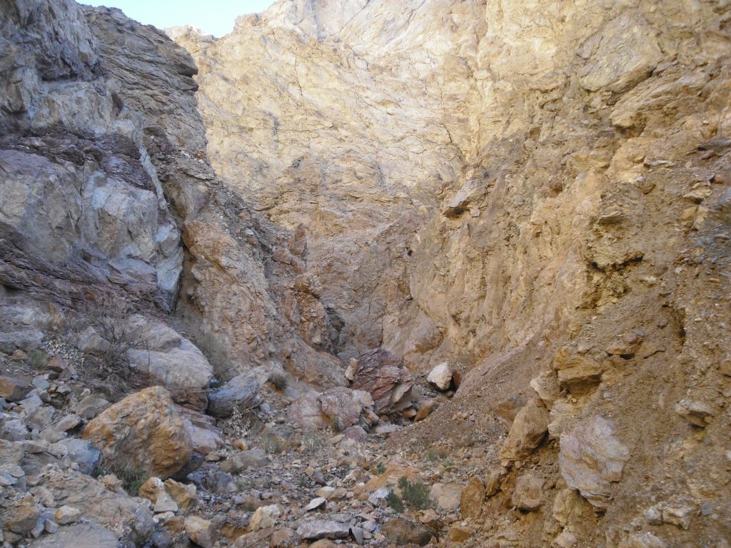 In the next three pictures, I have moved on past the colorful section of the canyon into some steep narrows: