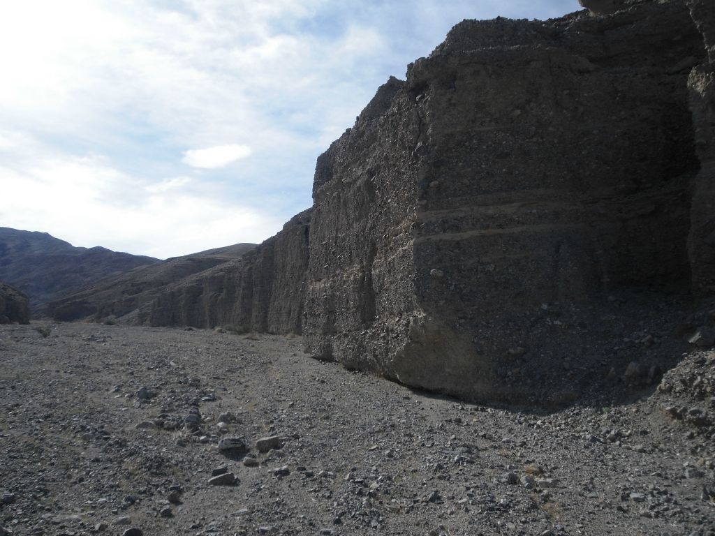 Huge block-like conglomerate rock walls in the early canyon: