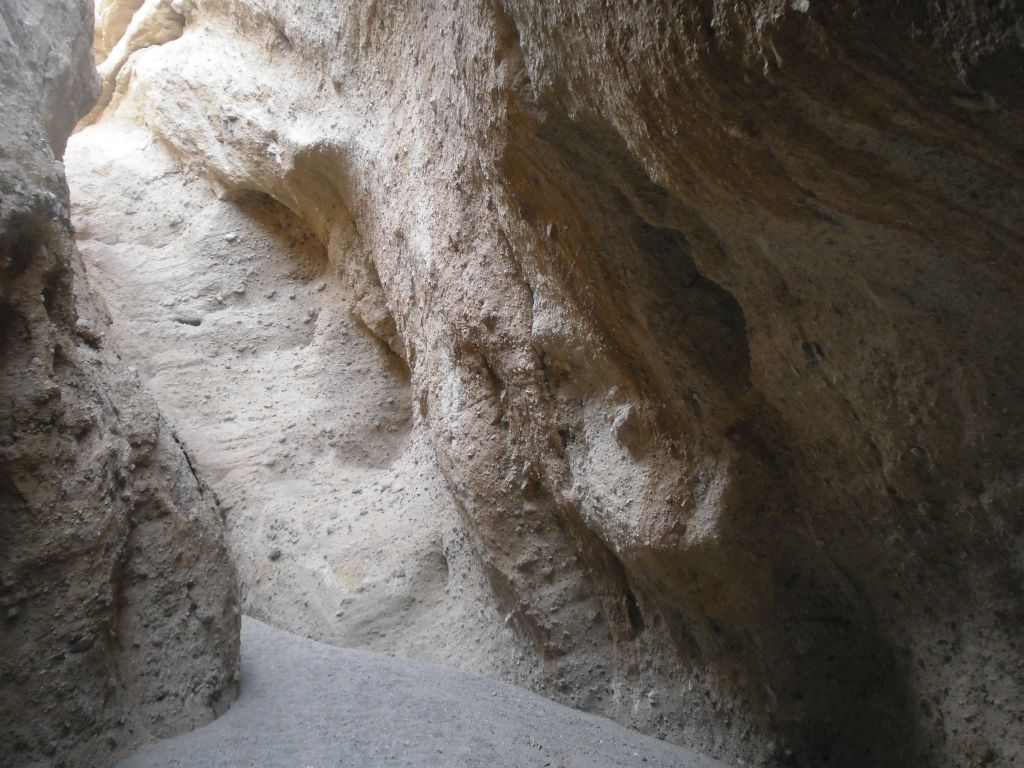 The walls were not vertical at times but instead hung over out into the wash: