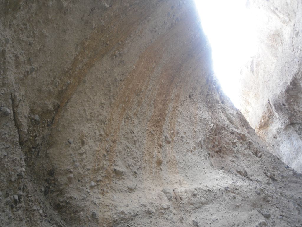 Check out the beautiful curved streaks across the canyon wall: