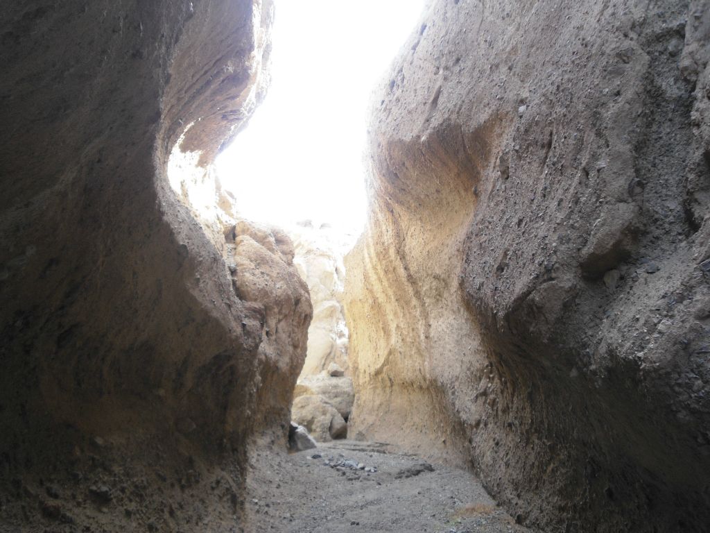 Notice how partway up the left side canyon wall there is a section which cuts into the conglomerate rock: