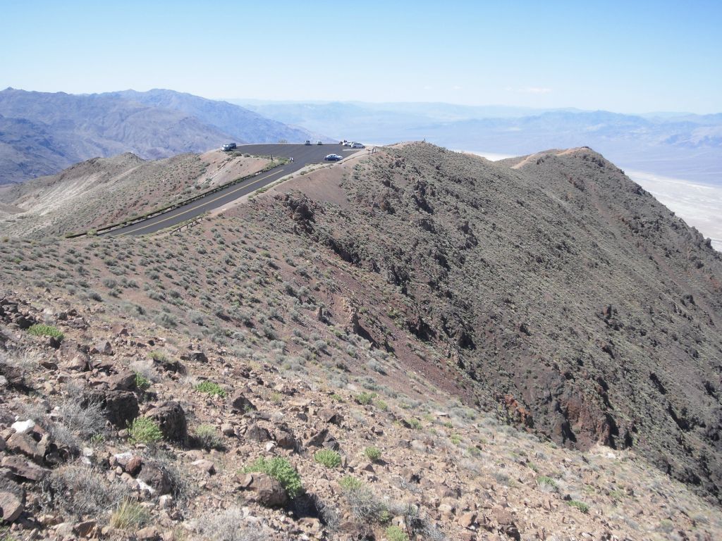 Looking back at the parking lot and tourists at the viewpoint: