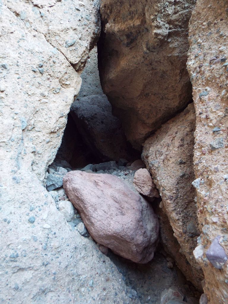 The boulders inside have fallen in such away that you can squeeze your way through spots like this: