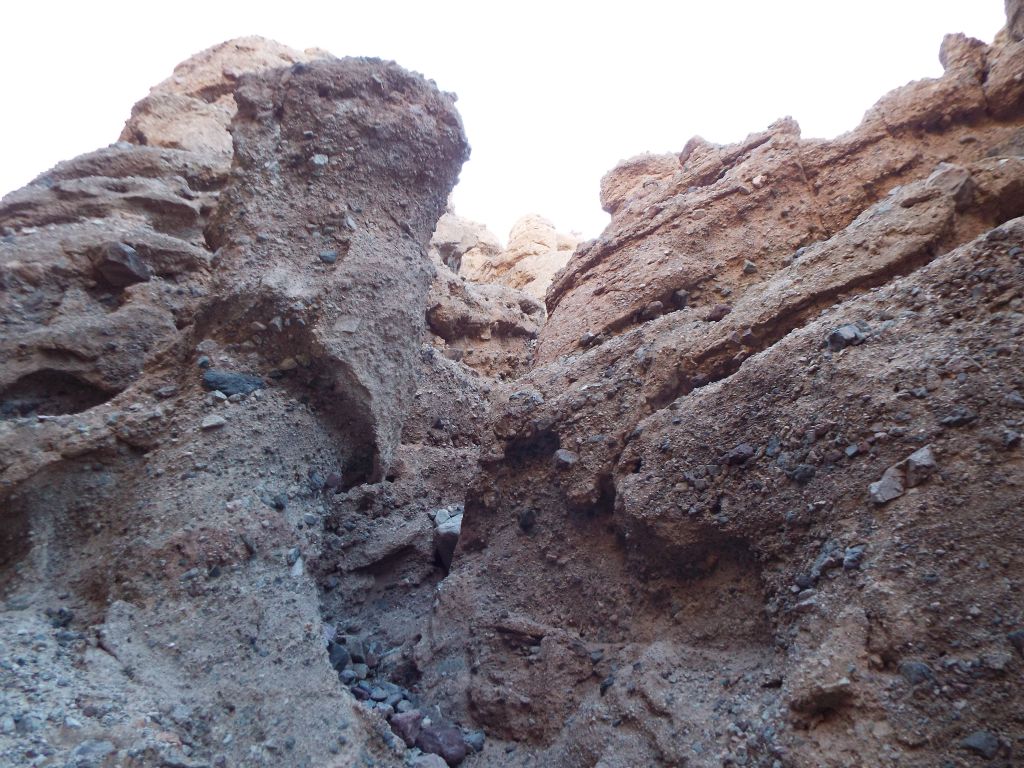 Looking up at a steep gully which flows down into the slot: