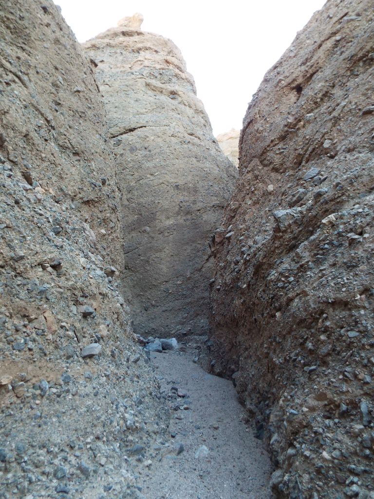 These two sides to the canyon and distant formation look nearly symmetrical: