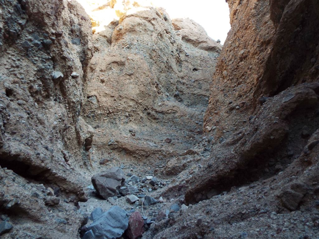 Slot canyon chaos with areas of erosion, the appearance of being trapped-in, and strange angles and designs everywhere: