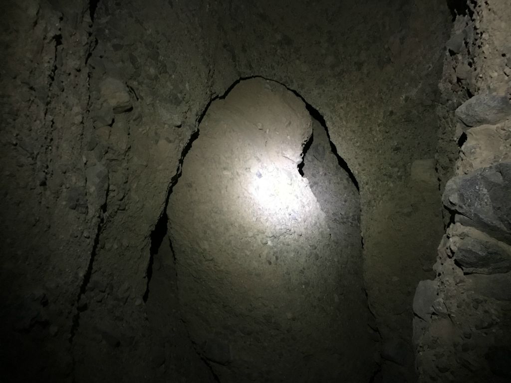 While walking down the cavern slot, this unmistakable natural bridge appeared in front of me, connecting the two sides of the canyon: