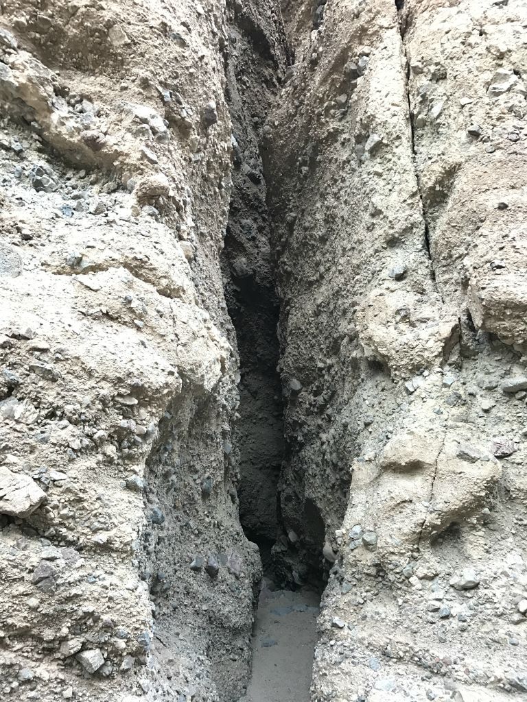 Back at the dark cavern slot entrance, it was interesting to check out the surrounding area and ponder how the slot had formed centuries or perhaps millenniums ago: