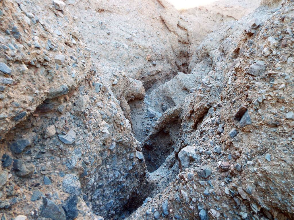 Near the bottom of the gully, it became too treacherous.  So I had to scramble to the south over into other gullies to finish the descent: