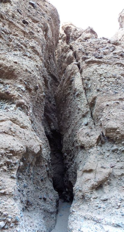 This is a top-to-bottom panoramic showing the entrance to the dark cavern portion of the slot.  You can imagine how exciting it was to be one of the few people who have ever entered into these narrows: