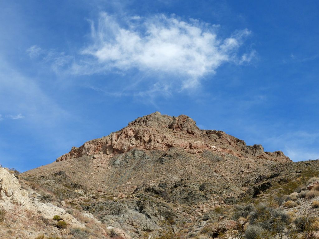 Looking up at the very prominent peak 5172T and clouds above it: