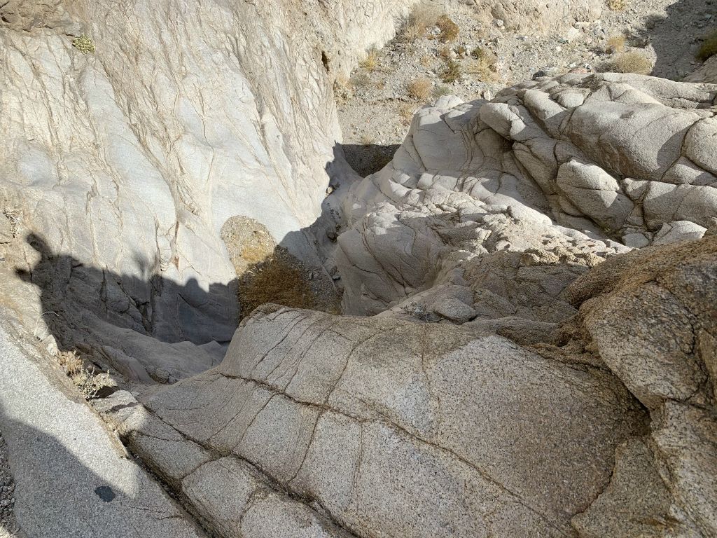 Looking straight down the 3rd major dry fall.  It had some polished rock with exposure, so we weren't comfortable trying to climb down it: