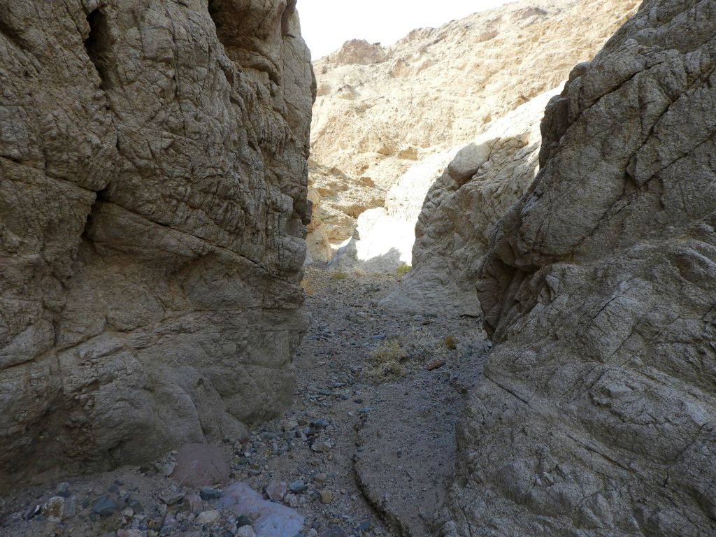 Passing through one of the narrowest sections of canyon where you can touch both walls at the same time: