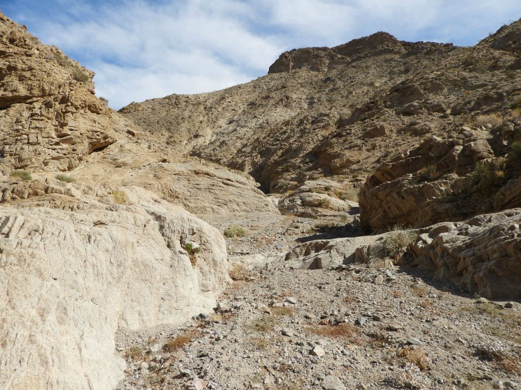 As we approached the middle canyon, the terrain became quite a bit different with solid rock extending down into the wash: