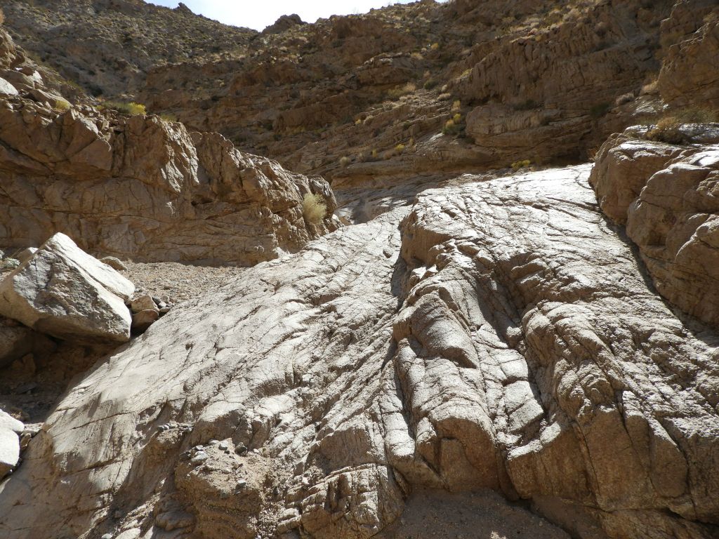 You can imagine the scene when a flash flood comes down this canyon and overflows on this polished rock: