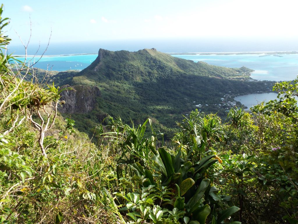 We were now well above the height of distant Mount Mataihua and the nearby Anau Ridges: