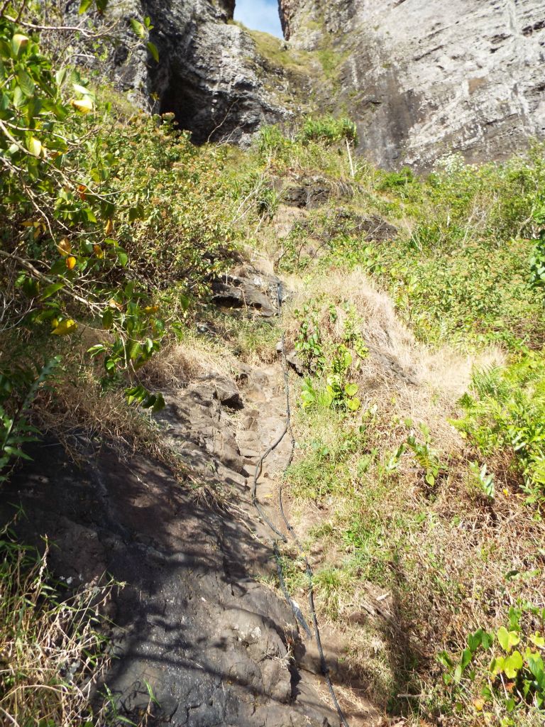 The final path to the cave combines very steep terrain with a series of mandatory rope climbs: