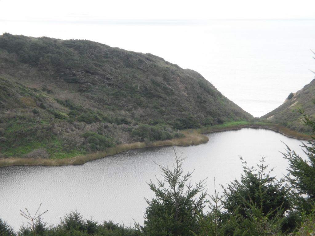 This is Pelican Lake, located a short distance past Bass Lake.  Pelican Lake is formed by a natural dam (right rear of picture), which prevents the water from draining into the Pacific: