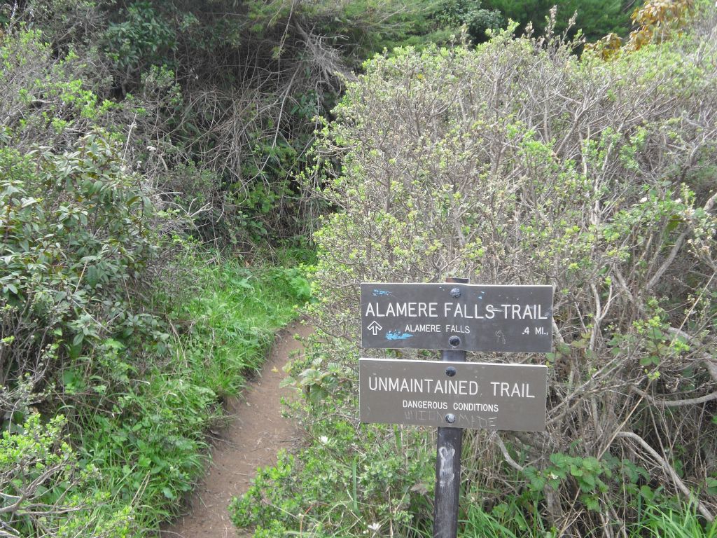 The turn-off onto the Alamere Falls trail, including warnings that it is unmaintained and potentially dangerous.  This route is no longer recommended by the NPS: