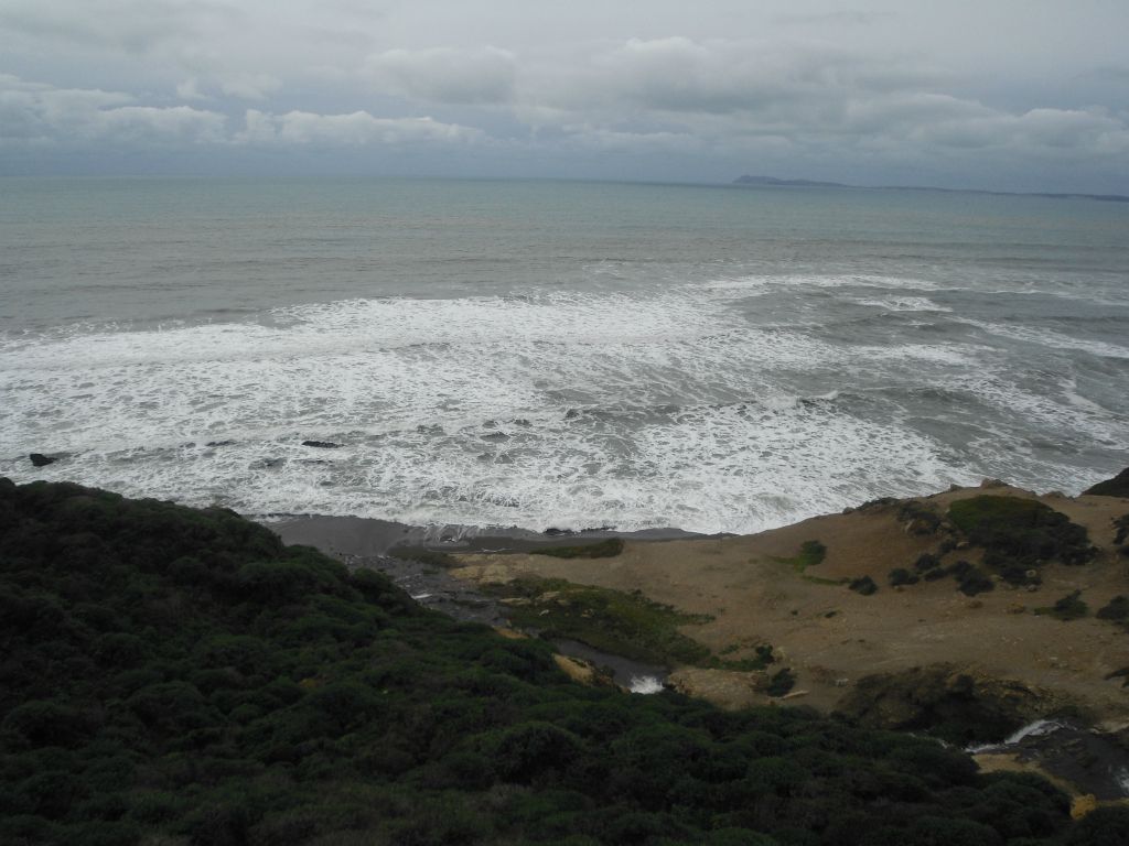 Getting closer now, as the trail descends rather quickly towards the beach: