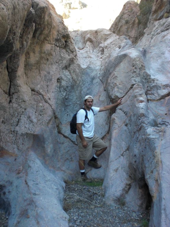 Steve stopping in front of the dry fall for a break and a picture: