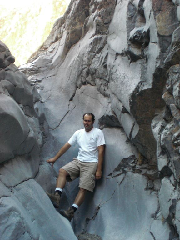 Steve getting a photo before attempting the slippery climb up: