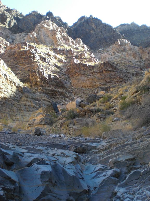 Looking up at some neat pyramid-like rock formations on the hillside: