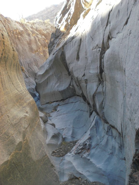 As you can see here, the walls and floor of the canyon are all solid rock: