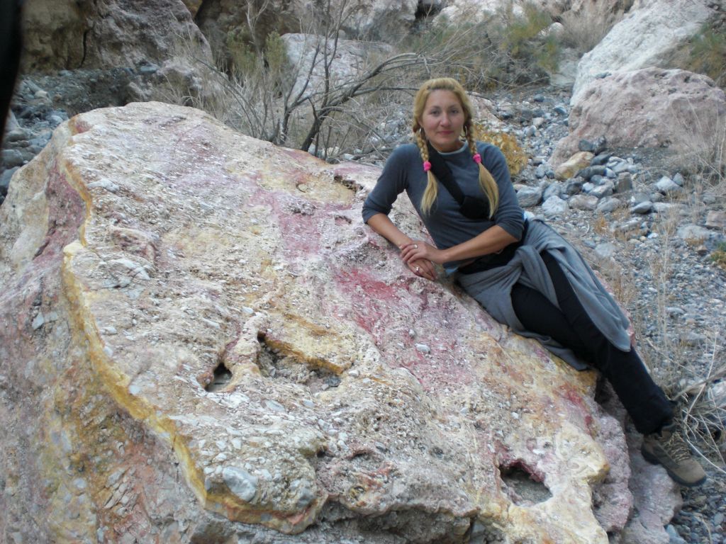 And Daria got her picture by this beautifully colored rock, which we found close to the junction with the Main Side Canyon: