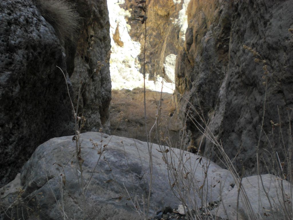 The next two pictures show you the boulder and dry fall which blocks further progress down the upper portion of the 1st Narrows.  It is possible to get slightly farther with a tricky downclimb here, but we turned around while we were ahead: