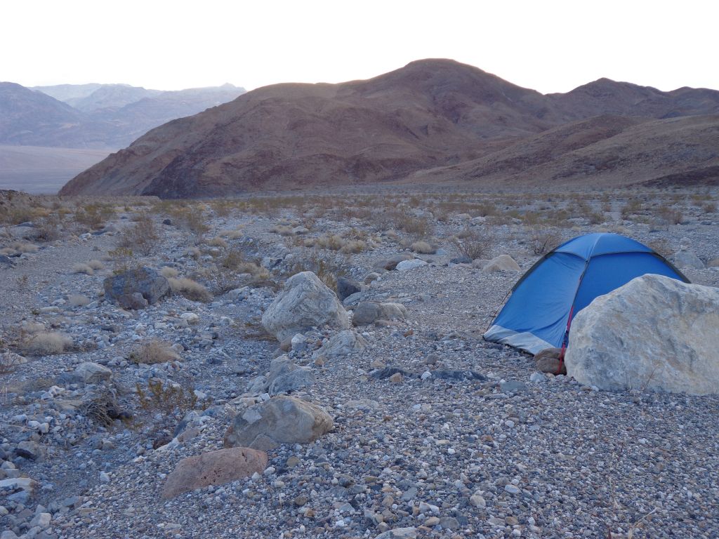 We set up our tents on a gravel bank above the wash with a nice view of the backside of Leaning BM: