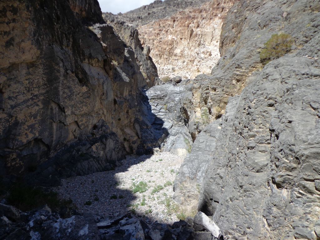 Oh no!  From the top of the rockslide, we could see a major dry fall up ahead in the canyon.  This is what I had been dreading for years during the planning stage of this hike: