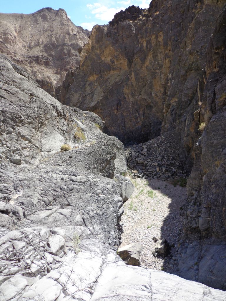 This view shows both the major dry fall and the rockslide in the canyon: