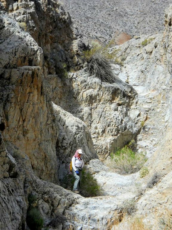 A picture of Debbie standing near the entrance of the 3rd side canyon: