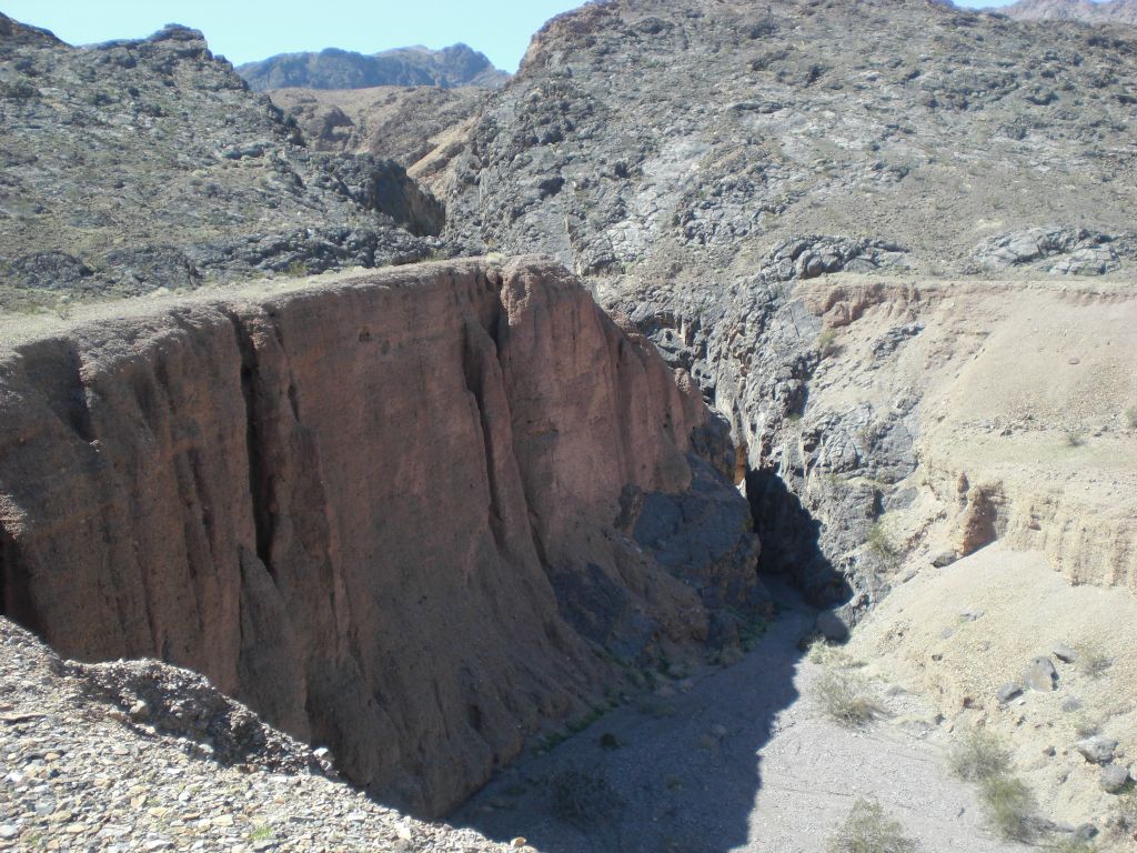 Looking down into the entrance of the narrows of Hidden Bridge Canyon from the cliffs above: