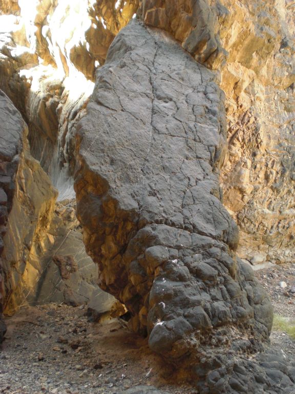 Notice that the rock on the outside is not smooth and polished like the inner rock: