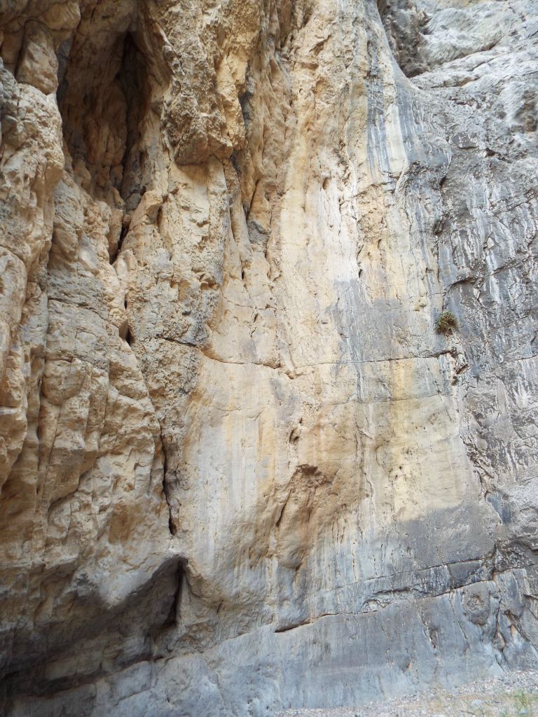 Two pictures showing the high colorful walls just inside the entrance to Lost Slot: