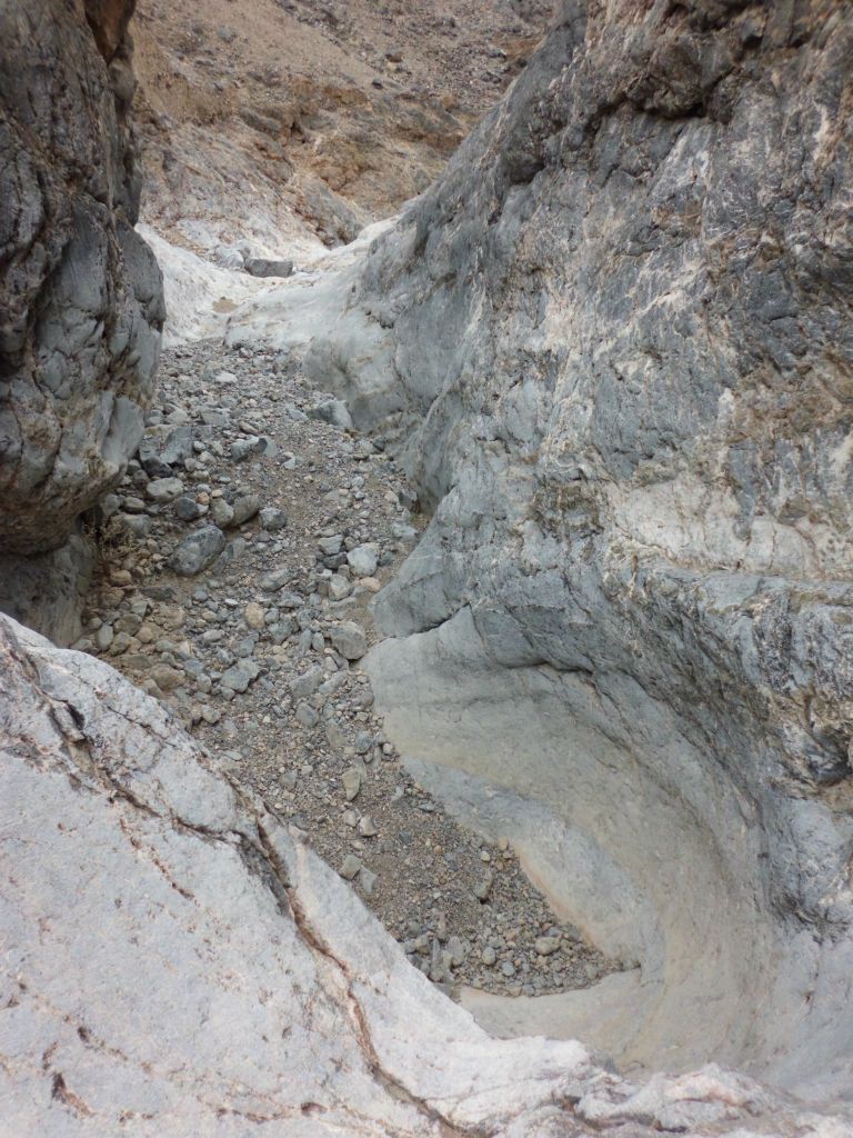 One of the continuous and odd features of Slab Canyon was the presence of uneven sections of canyon.  There were many spots where the canyon would have higher spots down canyon which would hinder natural water flow, thus creating dams and giant pools of water during flash floods: