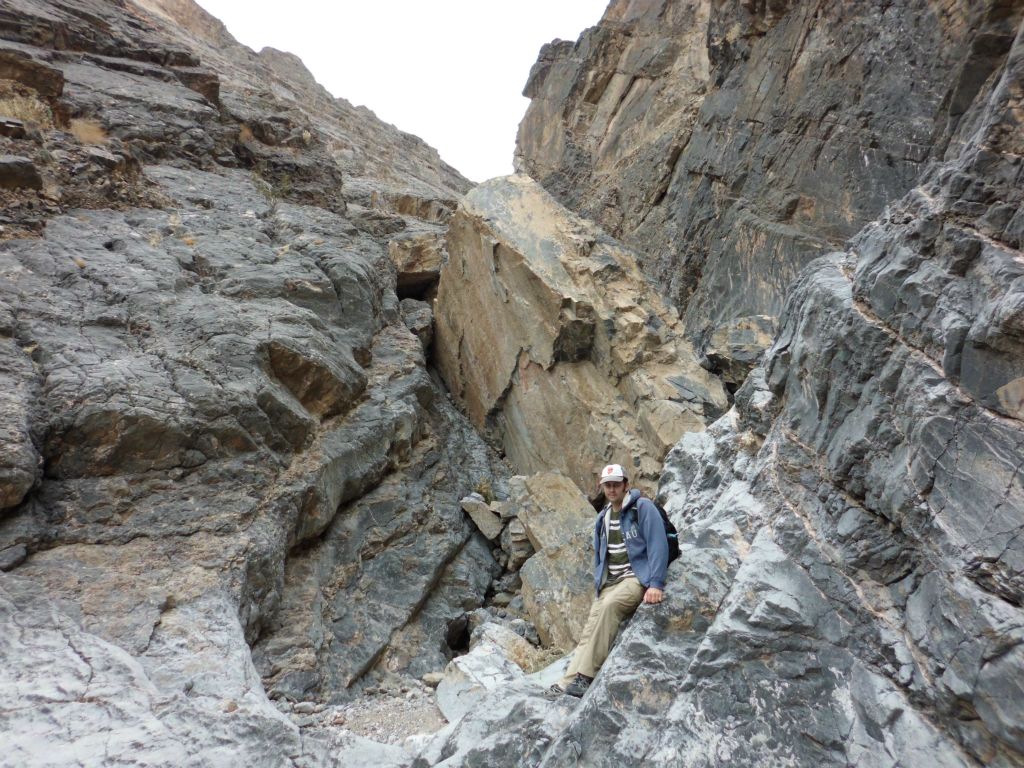 Steve getting a picture with the flat rock slab behind him: