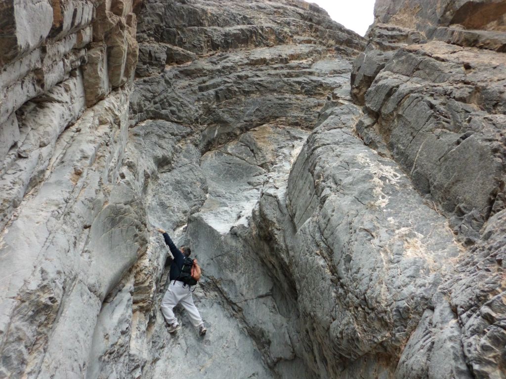 Patrick doing a tricky climb in order to continue up canyon.  We found an easier route to the right: