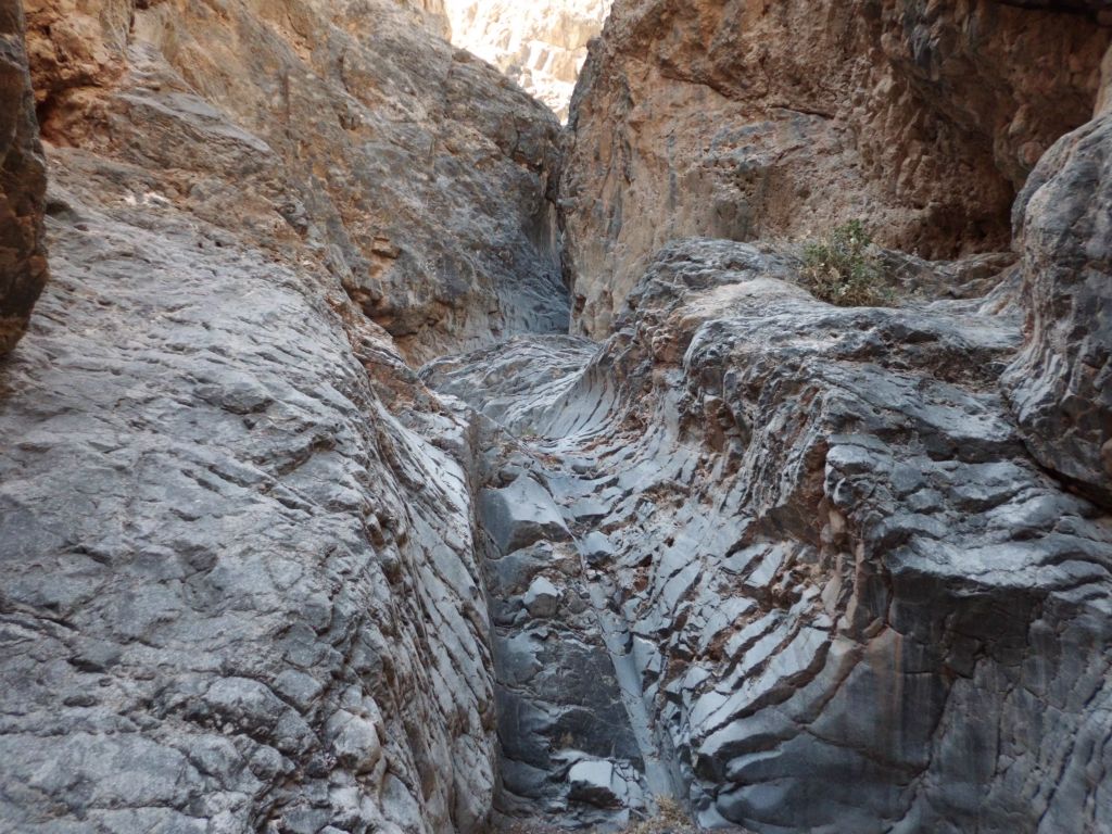 Walking down a slanted section of rock:
