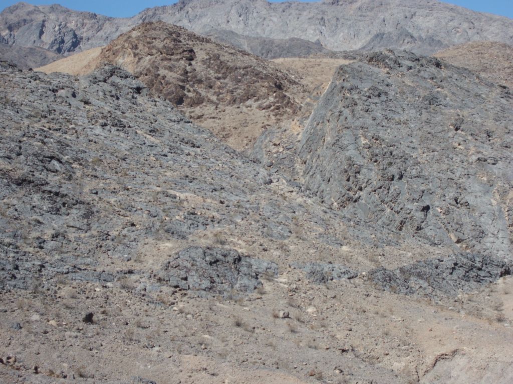 Overlooking the mouth of Hidden Bridge Canyon.  I followed the slope up to the left and dropped into the canyon on the other side.  Later in the day, I would bypass back out on the right side, which as you can see is a fair bit steeper and trickier to deal with: