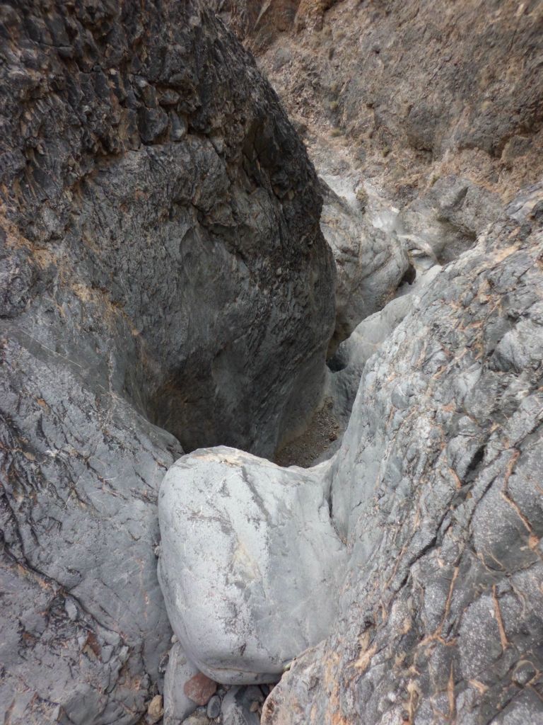 Upon using the bypass gully to drop into Middle Slab Canyon from the ridge above, if you hike down canyon from there, this is the view from the top of the 4th major dry fall: