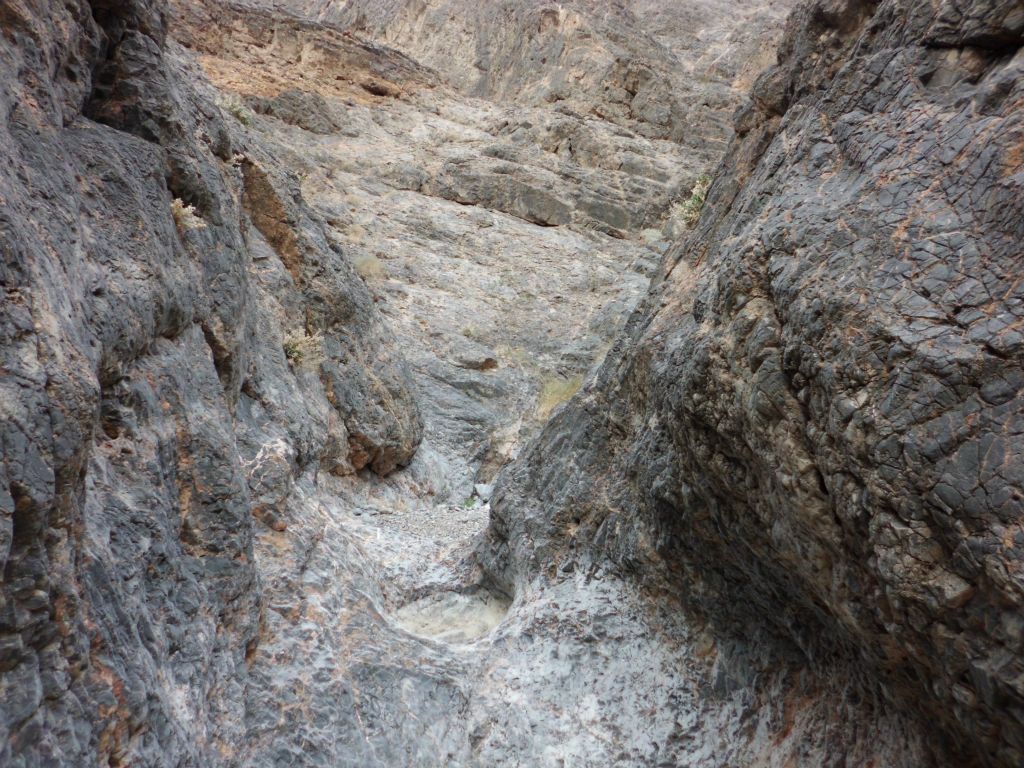 Notice how through these last couple sections of narrows, the canyon floor is made of solid rock: