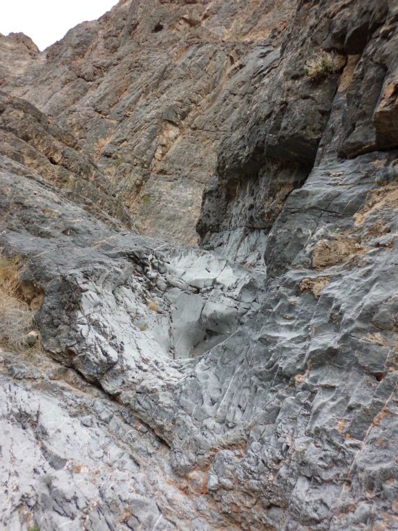 Things get interesting quickly with small polished dry falls to climb: