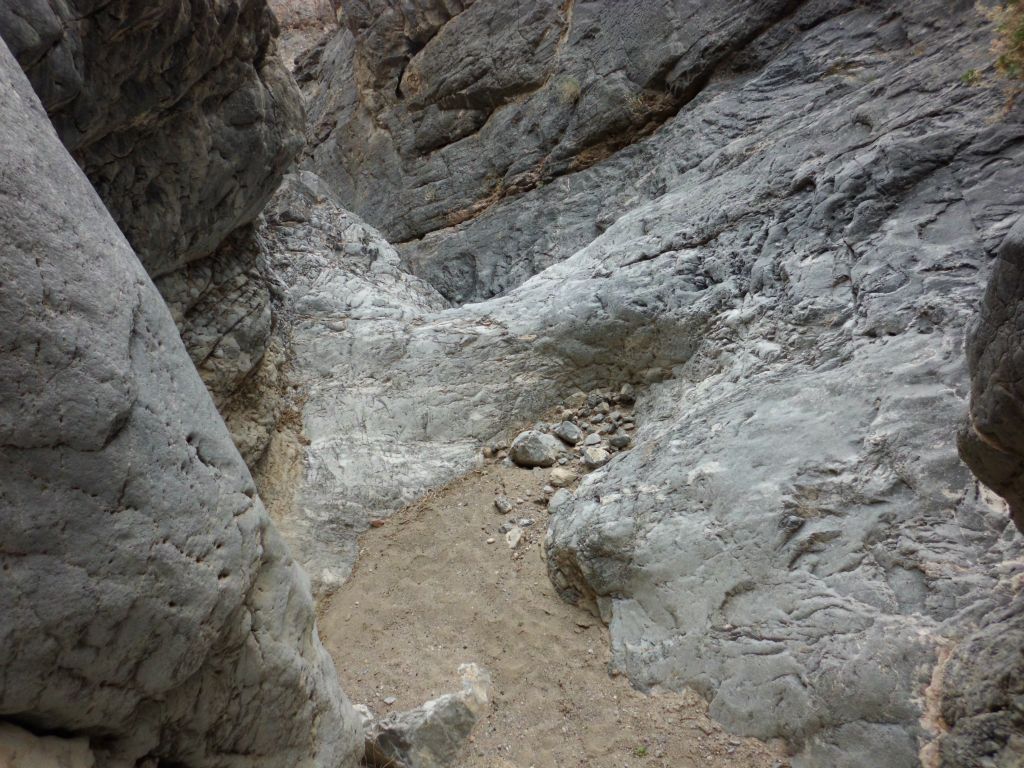 Sometimes the rock on the canyon floor would give way to patches of sand, dirt, and gravel: